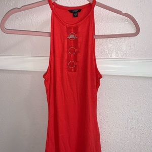 bright coral colored top